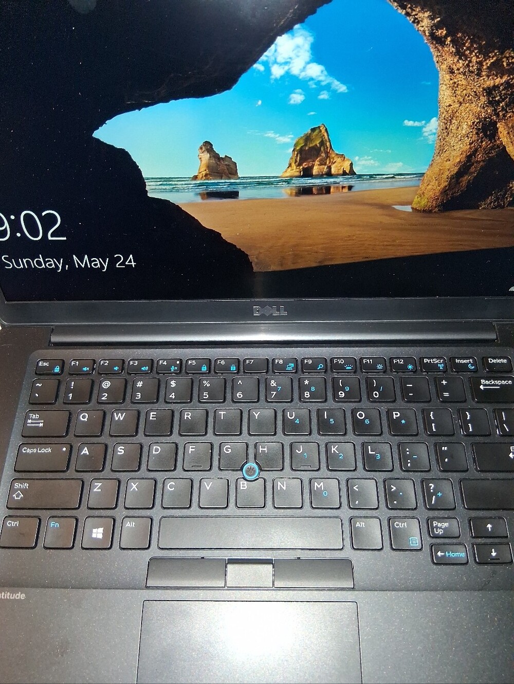 Dell Black Laptop with Blue TrackPoint and Black Keyboard